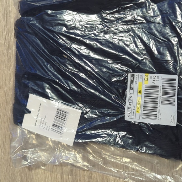 ABOUT YOU x Marie Von Behrens Regular Pants 'Eve' in Black- 6 - Picture 2 of 6